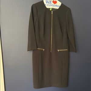 Elegant Black Dress with Gold Zipper Accents